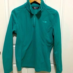The North Face woman’s teal fleece 3/4 zip up